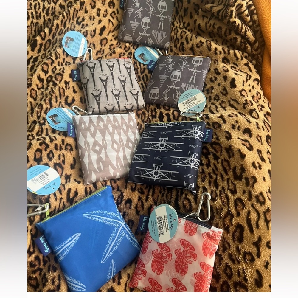 Rock flower paper blu bags, a lot of seven reusable totes all brand new